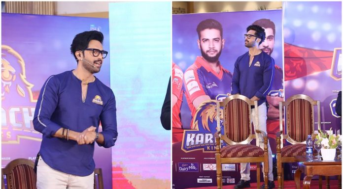Fahad Mustafa tussles with a sports journalist